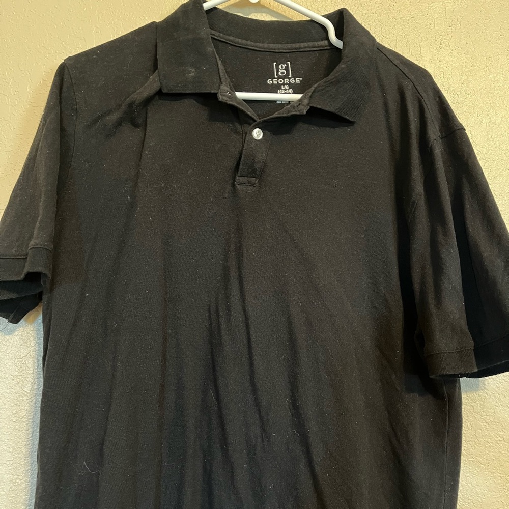 Large button up, collared shirt.